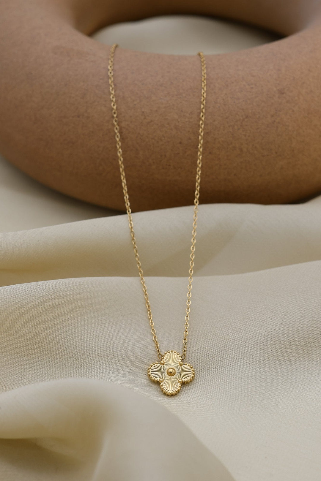 Golden Clover Necklace by FSL&CO, brushed gold clover pendant