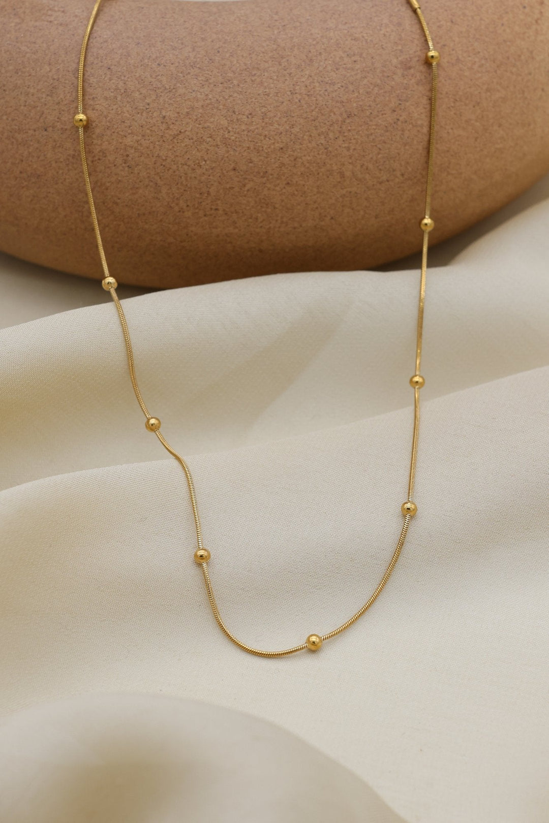 Golden Bead Necklace by FSL&CO, gold beads on a flat snake chain
