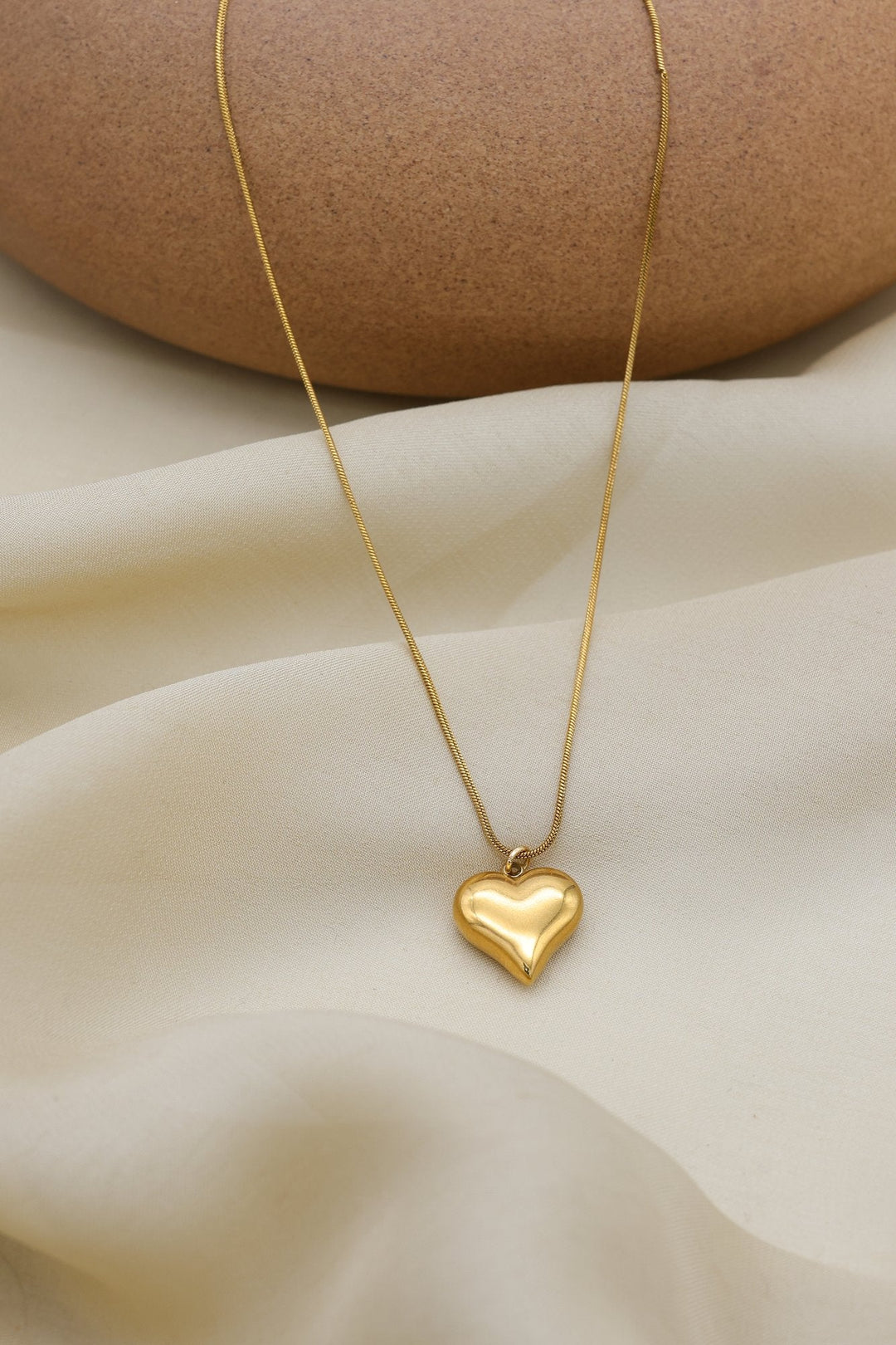 Puffy Heart Necklace by FSL&CO, polished puffed heart pendant