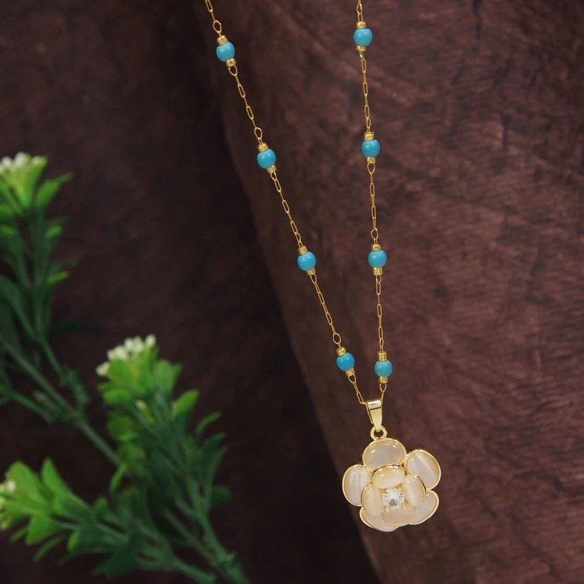 Turquoise Bloom Necklace by FSL&CO, close-up of the turquoise beadwork