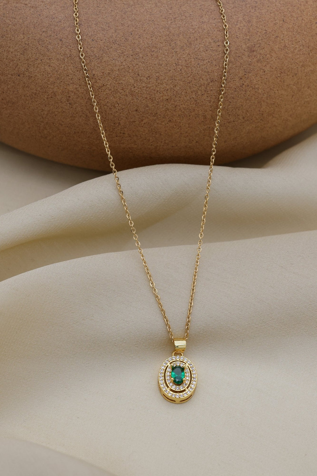 Emerald Halo Necklace by FSL&CO, emerald stone in a crystal halo setting