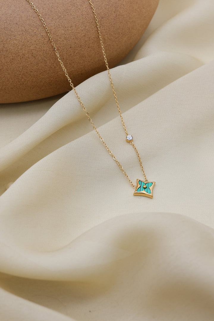 Emerald Clover Necklace by FSL&CO, emerald green clover with a crystal centre