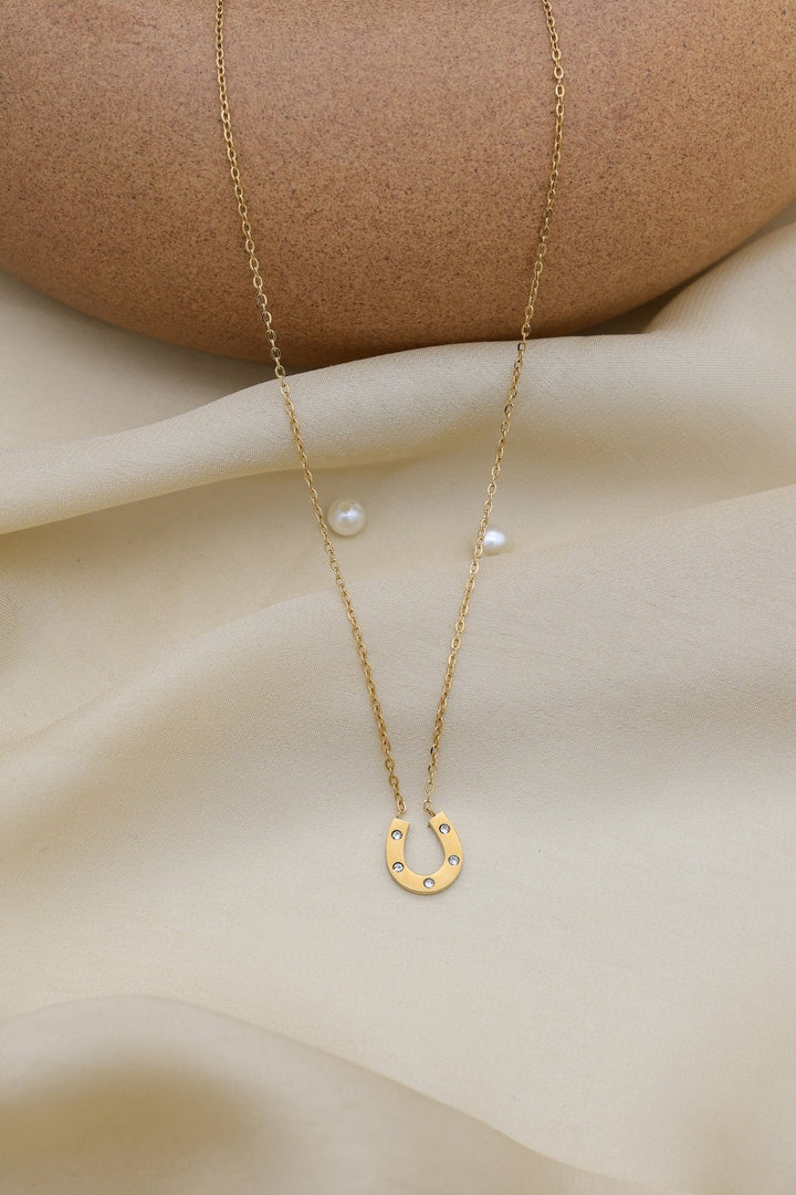Lucky Horseshoe Necklace by FSL&CO, gold horseshoe pendant